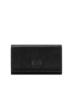 Vegetable-tanned leather key wallet holder glowing under natural light showing texture elegance