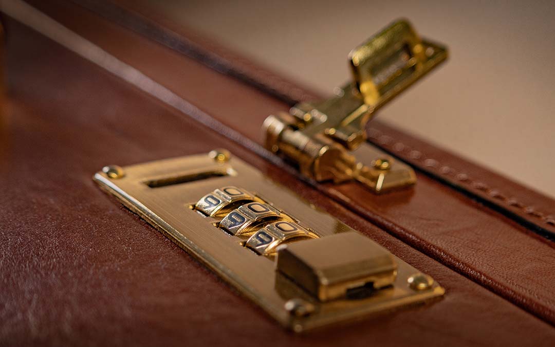 Cagiva twin brass combination locks on The Scanno slimline leather attaché case